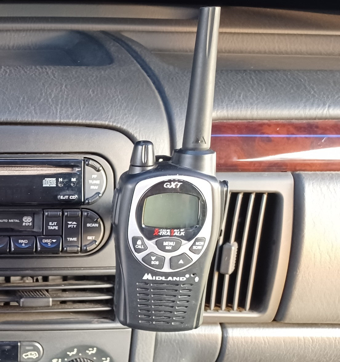 Hand-held radio mounting loop